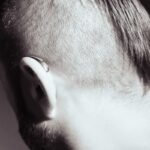 Close-up check of a natural-looking hairline