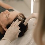Patient receiving aftercare following a hair transplant